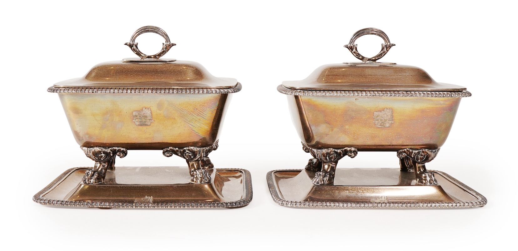 A pair of George IV silver sauce tureens with covers and integral stands, by Philip Rundell
